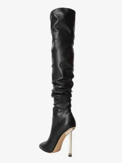 Cuissardes noires à talons hauts et bout pointu cuissardes souples