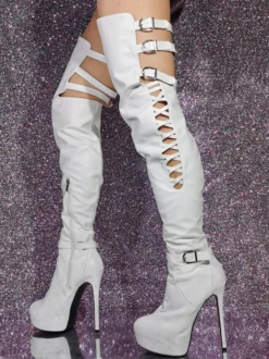 Cuissardes sexy noires à plateforme découpée sur les bottes au genou