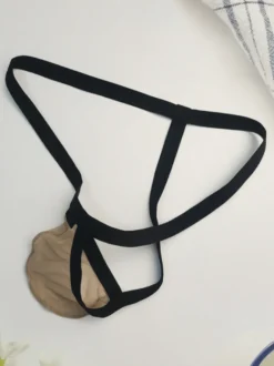 Culotte string sexy en maille rouge transparente pour homme