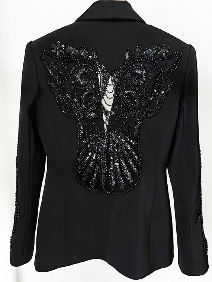 Ensemble blazer et pantalon en tulle noir à col en V en crêpe à sequins.
