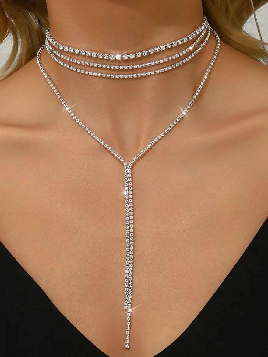 Ensemble de bijoux de mariage tendance en métal attrayant avec perles d'imitation.