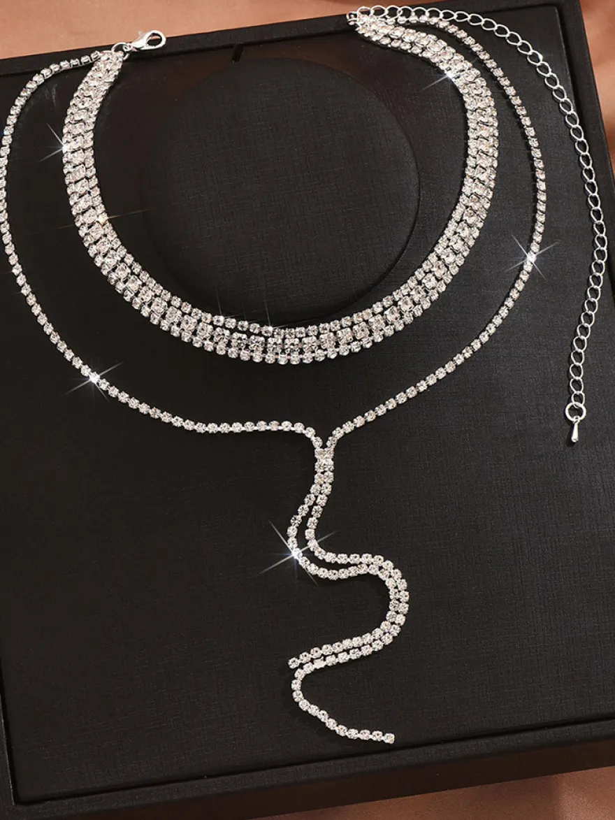 Ensemble de bijoux de mariage tendance en métal attrayant avec perles d'imitation.