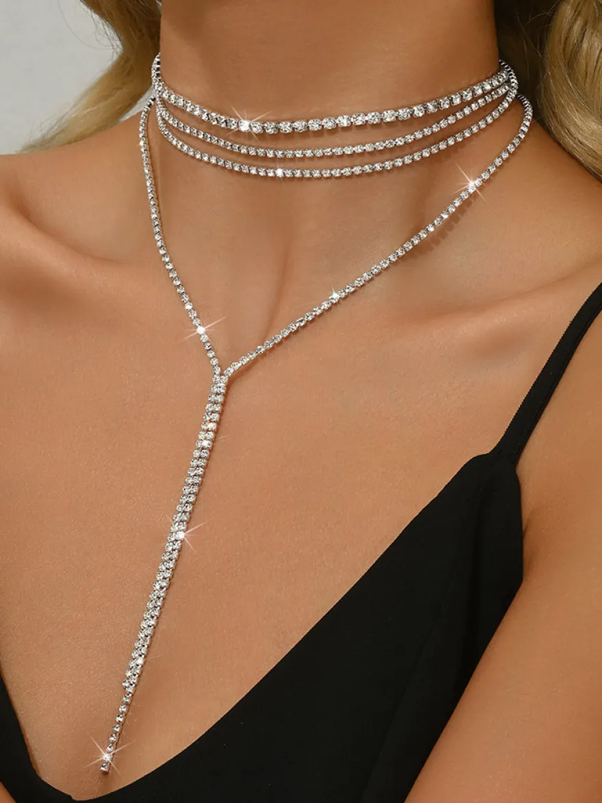 Ensemble de bijoux de mariage tendance en métal attrayant avec perles d'imitation.