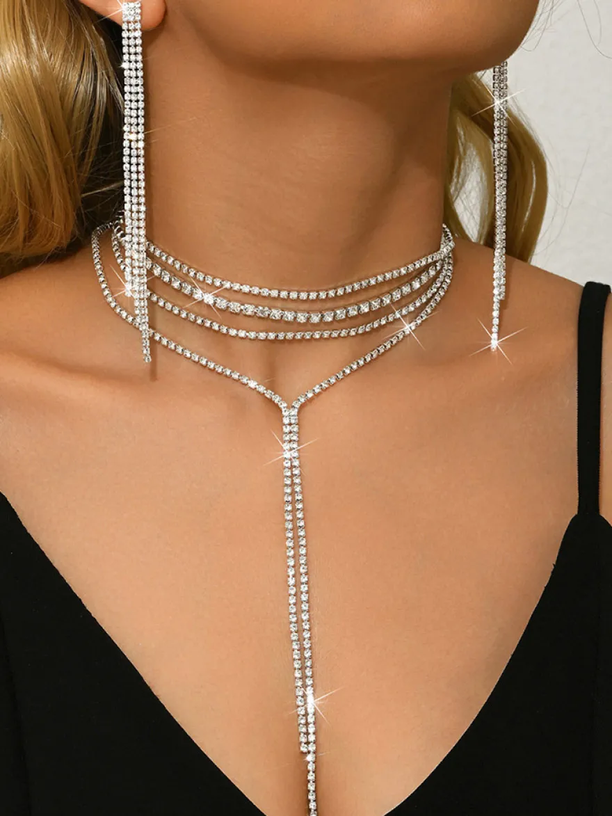 Ensemble de bijoux de mariage tendance en métal attrayant avec perles d'imitation.