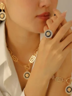 Ensemble de bijoux vintage à médaillon tête de lion motif géométrique grec chaîne collier boucles d'oreilles bague et bracelet 4 pièces