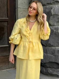 Ensemble 2 pièces pour femme : haut péplum à col en V et manches bouffantes noué sur le devant jupe longue sirène