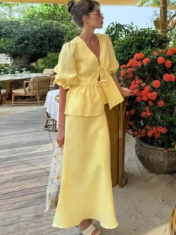 Ensemble 2 pièces pour femme : haut péplum à col en V et manches bouffantes noué sur le devant jupe longue sirène