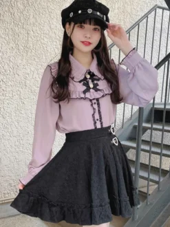 Jupe gothique lolita jupes lolita à volants et œillets noirs