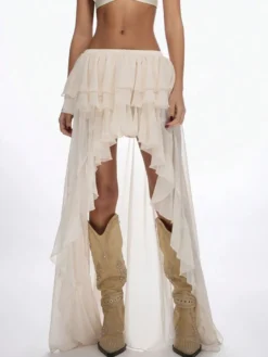 Jupe longue maxi à volants asymétriques pour femme en mousseline superposée fendue de façon irrégulière fluide idéale pour la plage.
