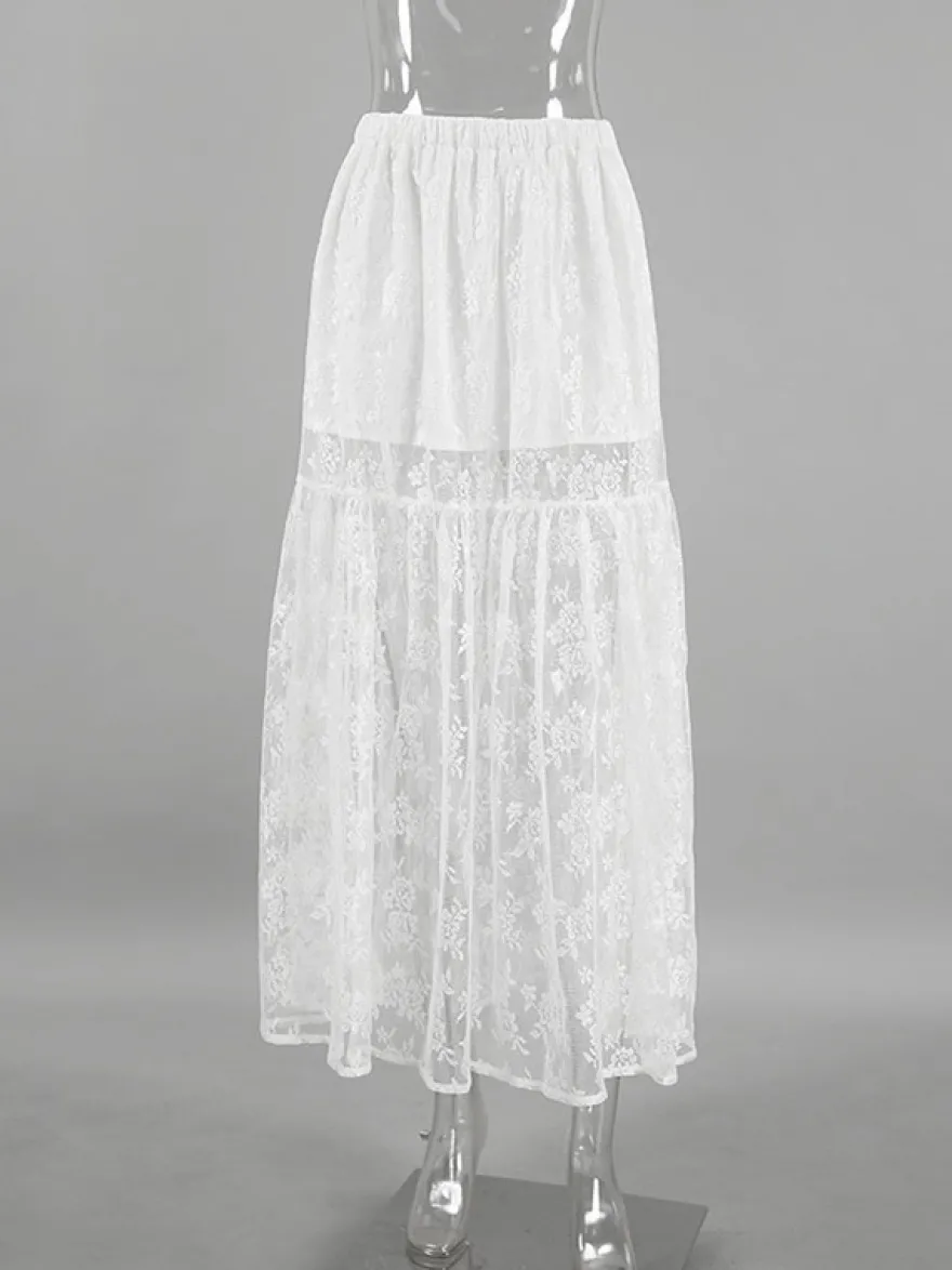 Jupe longue à volants en dentelle florale transparente à taille élastique noire et blanche transparente.