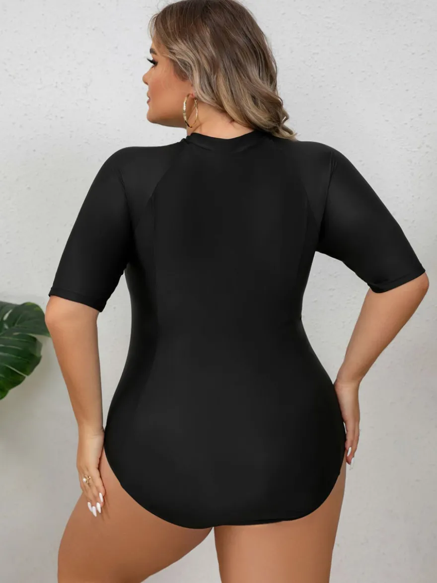 Maillot de bain anti-UV noir uni grande taille à manches mi-longues et fermeture éclair sur le devant