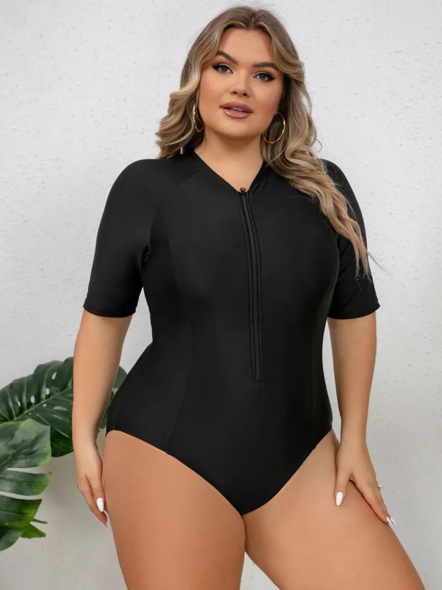 Maillot de bain anti-UV noir uni grande taille à manches mi-longues et fermeture éclair sur le devant