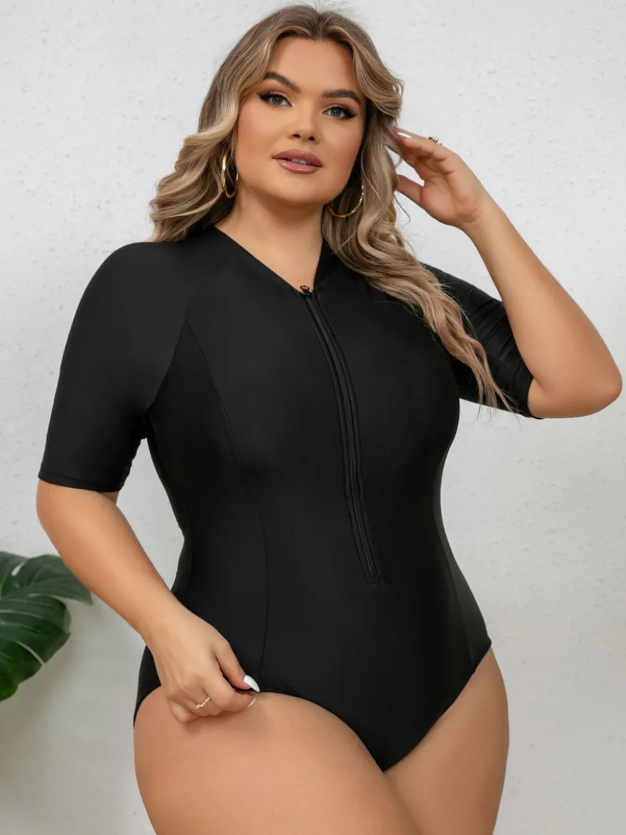 Maillot de bain anti-UV noir uni grande taille à manches mi-longues et fermeture éclair sur le devant