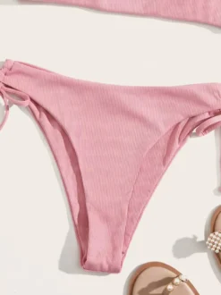 Maillot de bain bikini rose à lacets pour femme idéal pour l'été à la plage.