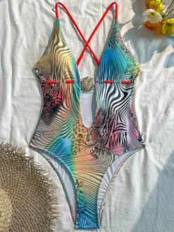 Maillot de bain une pièce monokini à imprimé zèbre et léopard dos croisé et bretelles croisées.