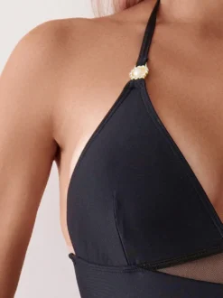 Maillots de bain une pièce pour femmes noirs à découpes dos nu asymétriques maillots de bain d'été pour la plage