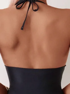 Maillots de bain une pièce pour femmes noirs à découpes dos nu asymétriques maillots de bain d'été pour la plage