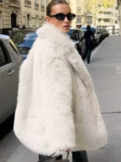 Manteau mi-long en fausse fourrure blanche à revers crantés Veste longue d'hiver écologique pour femme 2026