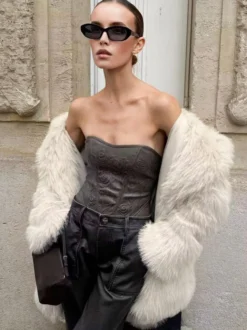 Manteau mi-long en fausse fourrure blanche à revers crantés Veste longue d'hiver écologique pour femme 2026