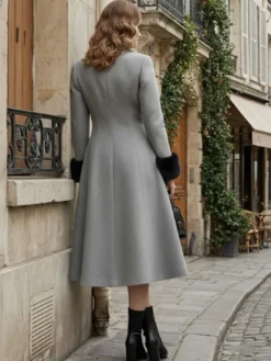 Manteau mi-long évasé croisé en laine mélangée avec poignets en fausse fourrure noire pour femme 2026