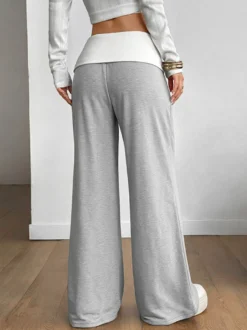 Pantalon en maille décontractée à taille haute et coutures avant color block taille large et coutures avant apparentes.