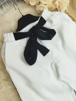 Pantalon femme à taille nœud papillon jambes larges rayures latérales taille haute fluide