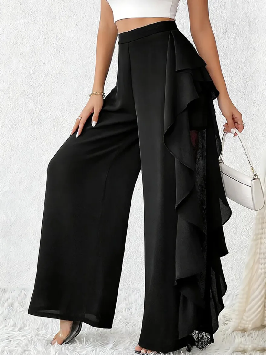 Pantalon noir uni à volants et taille naturelle idéal pour l'été