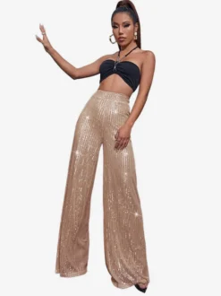 Pantalon palazzo à sequins taille haute et jambes larges style clubwear.
