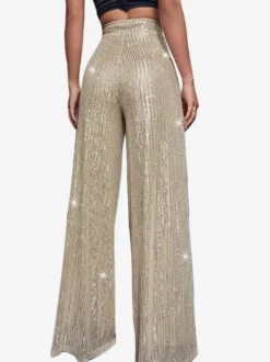 Pantalon palazzo à sequins taille haute et jambes larges style clubwear.