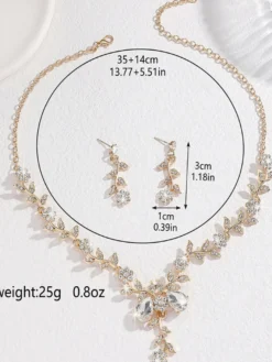 Parure de bijoux de mariage tendance élégante en métal et perles d'imitation.