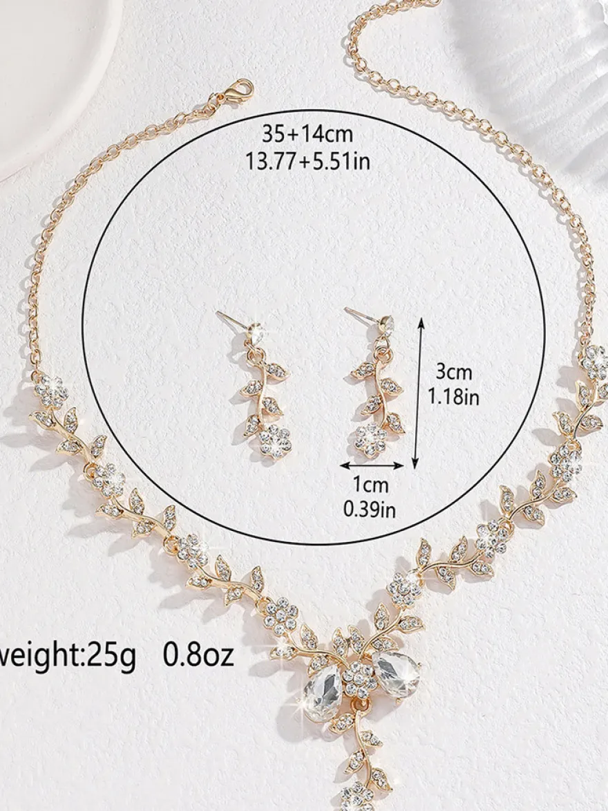 Parure de bijoux de mariage tendance élégante en métal et perles d'imitation.