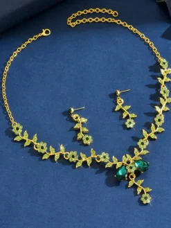Parure de bijoux de mariage tendance élégante en métal et perles d'imitation.