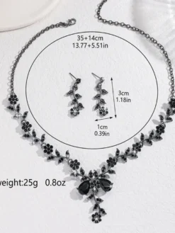 Parure de bijoux de mariage tendance élégante en métal et perles d'imitation.