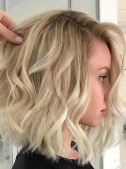 Perruque bob ondulée mi-longue dégradée bouclée et résistante à la chaleur avec raie au milieu. Cheveux synthétiques résistants à la chaleur.