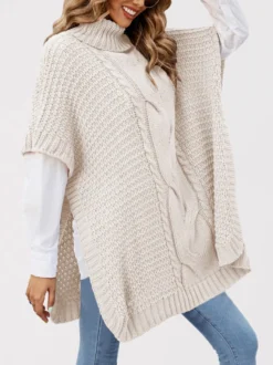 Pull ample décontracté à col montant en maille style cape sans manches en fil épais torsadé.