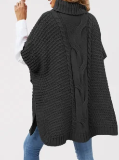 Pull ample décontracté à col montant en maille style cape sans manches en fil épais torsadé.