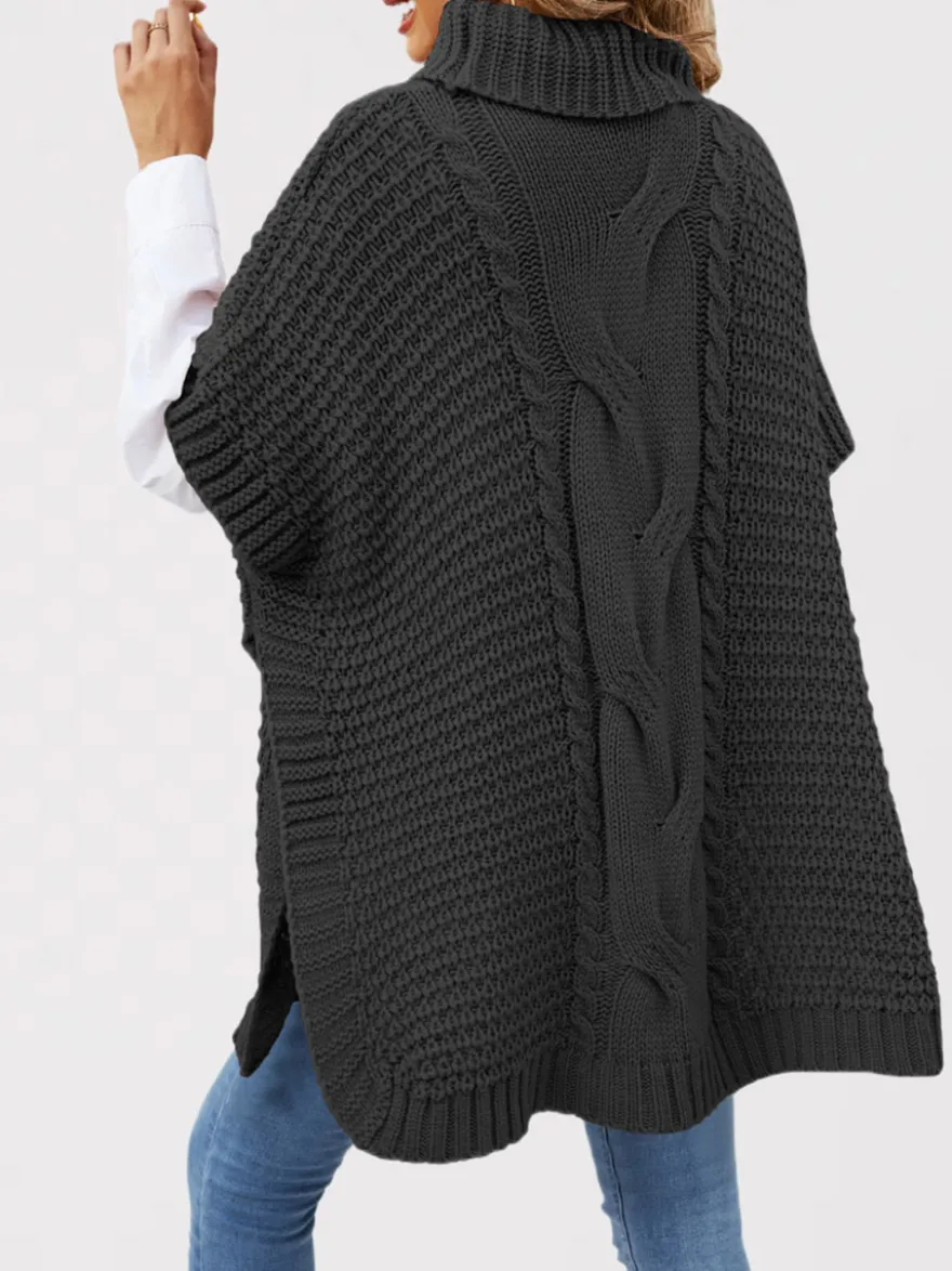 Pull ample décontracté à col montant en maille style cape sans manches en fil épais torsadé.