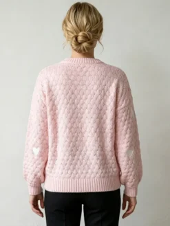 Pull à col rond en maille lâche manches longues motif jacquard à cœur style décontracté.