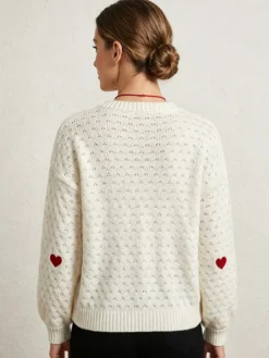 Pull à col rond en maille lâche manches longues motif jacquard à cœur style décontracté.