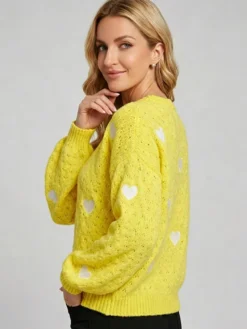 Pull à col rond en maille lâche manches longues motif jacquard à cœur style décontracté.