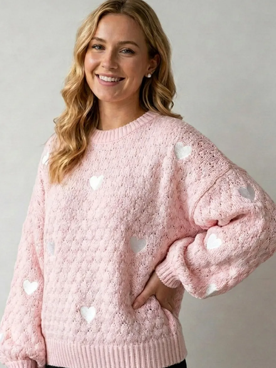 Pull à col rond en maille lâche manches longues motif jacquard à cœur style décontracté.