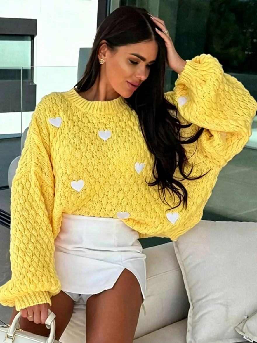Pull à col rond en maille lâche manches longues motif jacquard à cœur style décontracté.