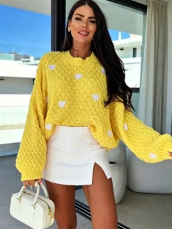 Pull à col rond en maille lâche manches longues motif jacquard à cœur style décontracté.