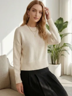 Pull court à col rond épaules tombantes manches longues coupe ample couleur unie pour femme