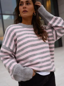 Pull rayé à col rond en maille manches longues amples style décontracté pour femme.