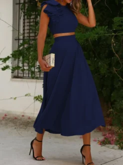 Robe cocktail élégante deux pièces longueur thé col rond plissée