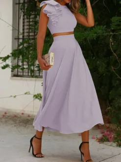 Robe cocktail élégante deux pièces longueur thé col rond plissée