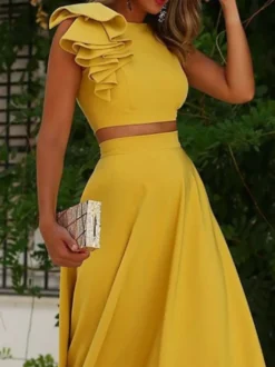 Robe cocktail élégante deux pièces longueur thé col rond plissée