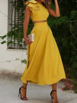 Robe cocktail élégante deux pièces longueur thé col rond plissée
