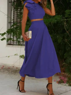 Robe cocktail élégante deux pièces longueur thé col rond plissée